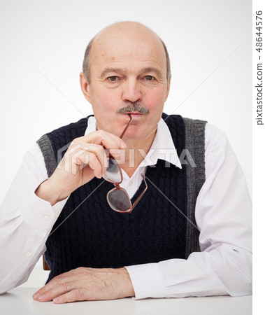Elderly bald man with a mustache Elderly bald man with a mustache 48644576