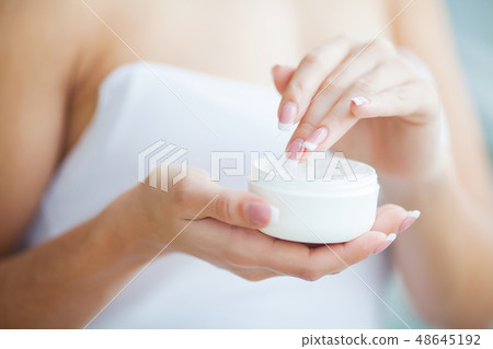 Hand Skin Care. Close Up Of Female Hands Holding Cream Tube, Beautiful Woman Hands With Natural Hand Skin Care. Close Up Of Female Hands Holding Cream Tube, Beautiful Woman Hands With Natural 48645192