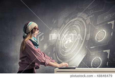 She is surfing the Internet She is surfing the Internet 48646479