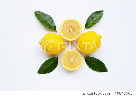 Lemon and slices with leaves isolated on white. Lemon and slices with leaves isolated on white. 48647763