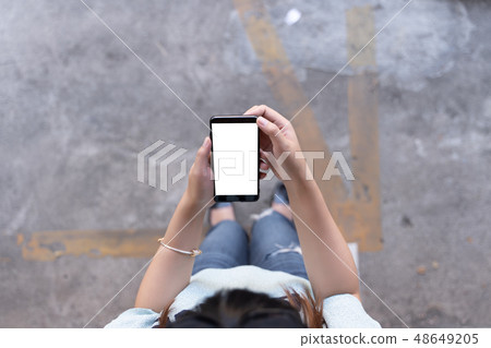 Woman using tablet Mockup for your own content at Woman using tablet Mockup for your own content at 48649205