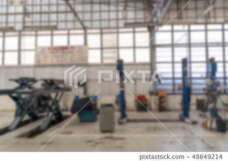 Blurred dealership store Blurred Car raised on Blurred dealership store Blurred Car raised on 48649214