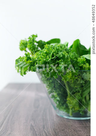 Kale leaves salad, healthy eating Kale leaves salad, healthy eating 48649352