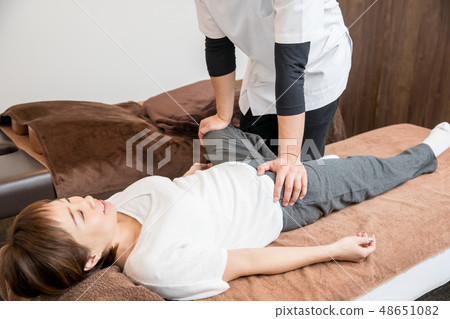 A woman receiving accommodation A woman receiving accommodation 48651082