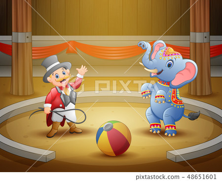 Circus ringmaster performs a trick along 48651601