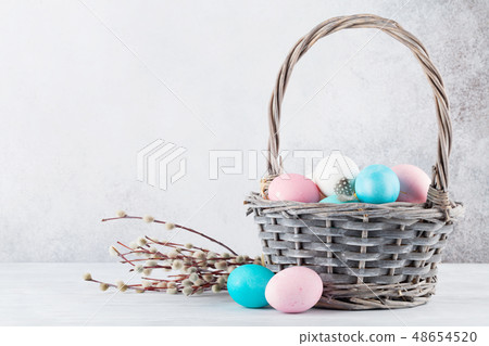 Easter eggs in basket Easter eggs in basket 48654520