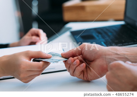 business workplace corruption cash money bribe 48655274