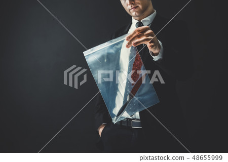 Officer showing a knife with blood as an evidence 48655999