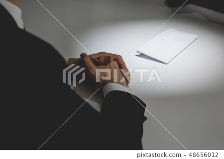 Businessman offering money in the envelope on the Businessman offering money in the envelope on the 48656012