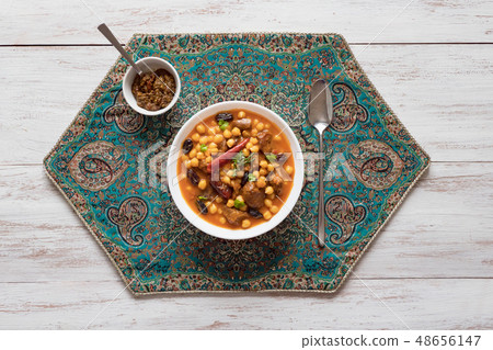 Harissa Lamb with chickpeas and apricots. Top view 48656147