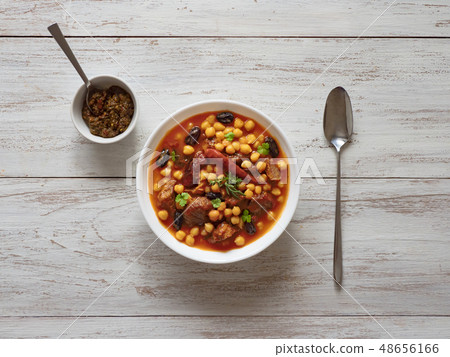 Harissa Lamb with chickpeas and apricots. Top view 48656166