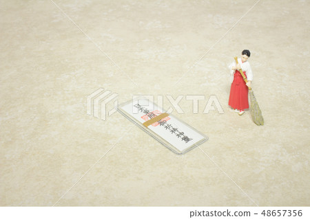 a figure of Shrine maiden with Omamori a figure of Shrine maiden with Omamori 48657356