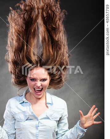 Happy and ecstatic woman girl having fun. Motion. 48657789