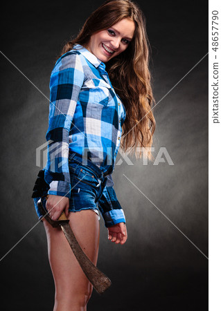 Sexy alluring woman holding hammer. Feminism. Sexy alluring woman holding hammer. Feminism. 48657790
