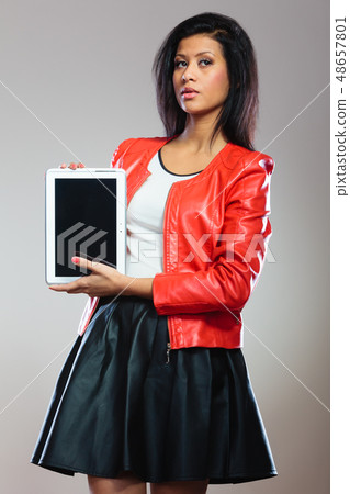 Young woman with tablet Young woman with tablet 48657801