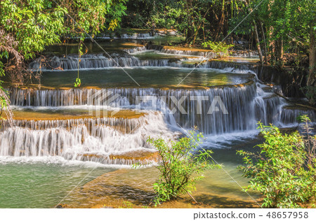 Huai Mae Khamin Waterfall in the morning light Huai Mae Khamin Waterfall in the morning light 48657958