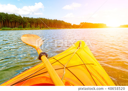 Kayaking on the water 48658520