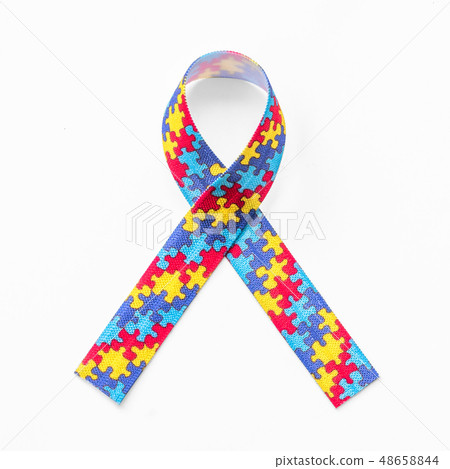 Autism awareness ribbon in puzzle jigsaw pattern Autism awareness ribbon in puzzle jigsaw pattern 48658844