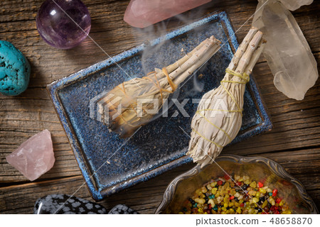 Burning white sage incense 48658870
