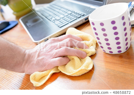 Hand cleaning desk at home Hand cleaning desk at home 48658872