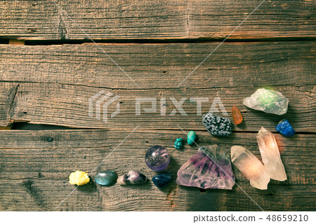 Multiple semi precious gemstones on board 48659210