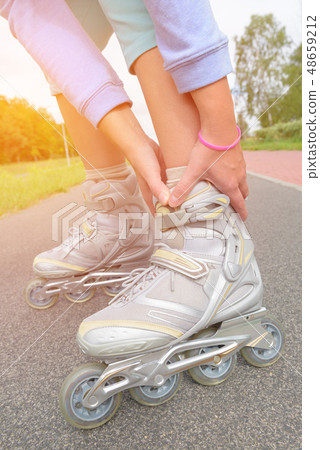 Woman on roller skates 48659212