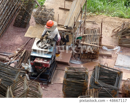 Working at the steel bar bending yard Working at the steel bar bending yard 48667117