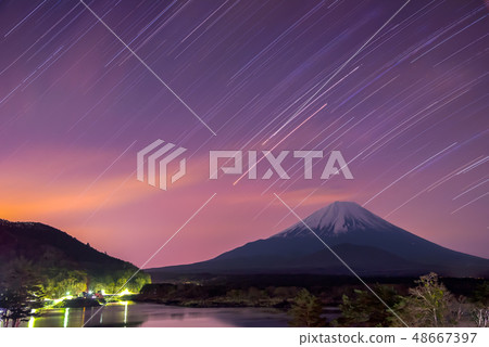 Fuji crowning the snow Night view desired from Lake Seiko Stars trajectory Yamanashi Japan 48667397