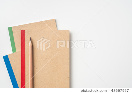 3 kraft notebook and pen on white background 3 kraft notebook and pen on white background 48667937