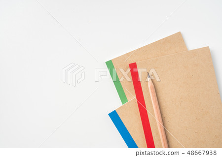 3 kraft notebook and pen on white background 3 kraft notebook and pen on white background 48667938