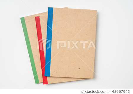 3 kraft notebook and pen on white background 3 kraft notebook and pen on white background 48667945