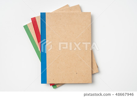 3 kraft notebook and pen on white background 3 kraft notebook and pen on white background 48667946