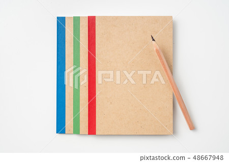 3 kraft notebook and pen on white background 3 kraft notebook and pen on white background 48667948
