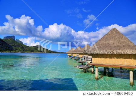 Water bungalows and sacred mountains Otemanu mountain (Bora Bora, Tahiti) Water bungalows and sacred mountains Otemanu mountain (Bora Bora, Tahiti) 48669490