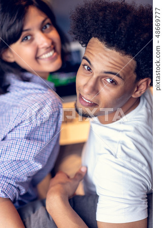 happy young african couple with laptop computer 48669777