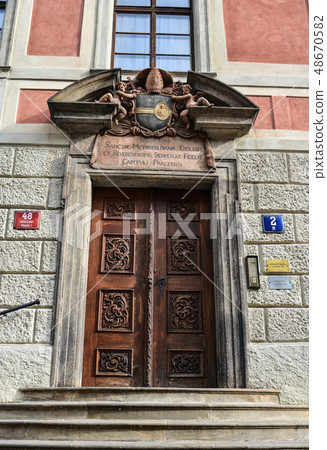 Ornate old carved wooden door Ornate old carved wooden door 48670582