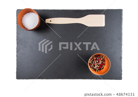 spices on a slate board spices on a slate board 48674131