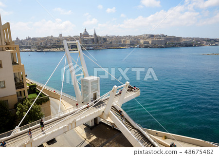 The white bridge in Sliema and view on Valleta The white bridge in Sliema and view on Valleta 48675482