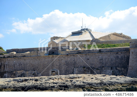 The view on defence buildings at seafront, Malta 48675486