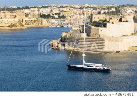 The view on Vittoriosa and yachts in sunset, Malta 48675491
