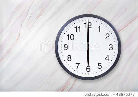 Wall clock show six o'clock on marble texture. Office clock show 6pm or 6am Wall clock show six o'clock on marble texture. Office clock show 6pm or 6am 48676375