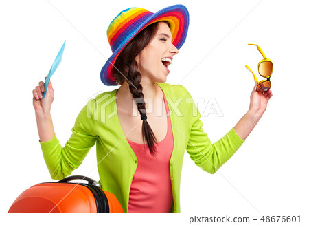 Portrait of female tourist with travel suitcase Portrait of female tourist with travel suitcase 48676601