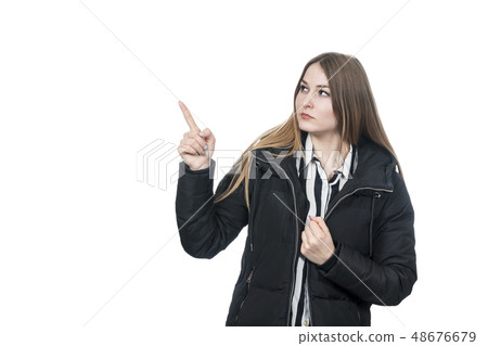 woman in coat points finger woman in coat points finger 48676679
