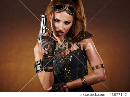 Steampunk woman over gunge background. . Fantasy 48677142