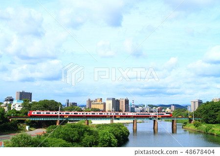 Okazaki city urban landscape Meitetsu train running in Okazaki city 48678404