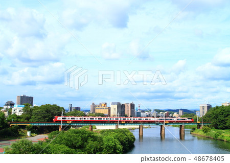 Okazaki city urban landscape Meitetsu train running in Okazaki city 48678405