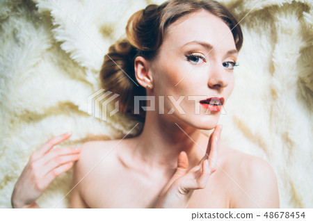 Beautiful portrait of young girl in retro style Beautiful portrait of young girl in retro style 48678454