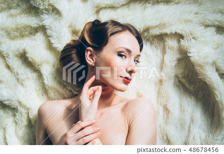 Beautiful portrait of young girl in retro style 48678456