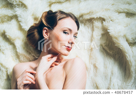 Beautiful portrait of sly young girl in retro 48678457