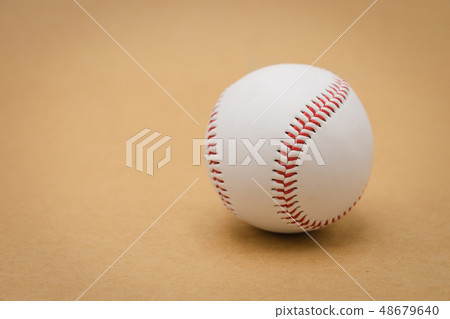 Isolated baseball on a brown background and red 48679640